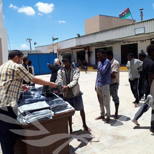 Humanitarian aid for migrants, airport road shelter